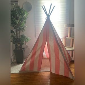 children’s cloth and wood stick tent